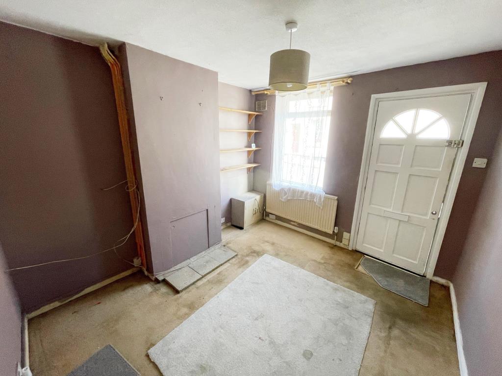 Lot: 144 - TERRACE HOUSE FOR IMPROVEMENT - Living Room with Window to front and entrance door
